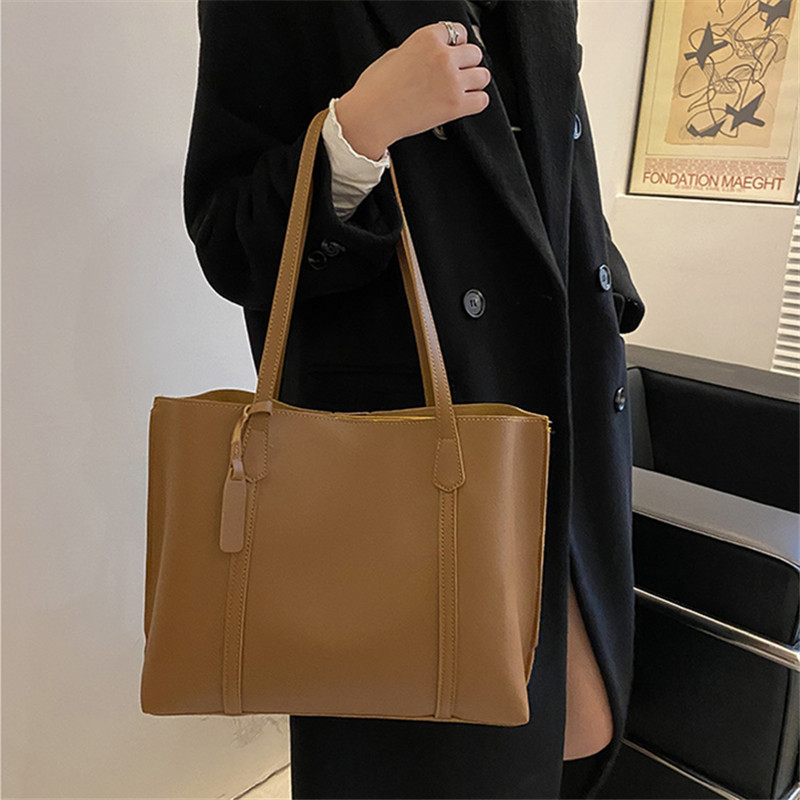 Classic Black Faux Leather Tot - огляд і ціна Leather Work Handbag